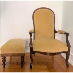 Armchair with footrest