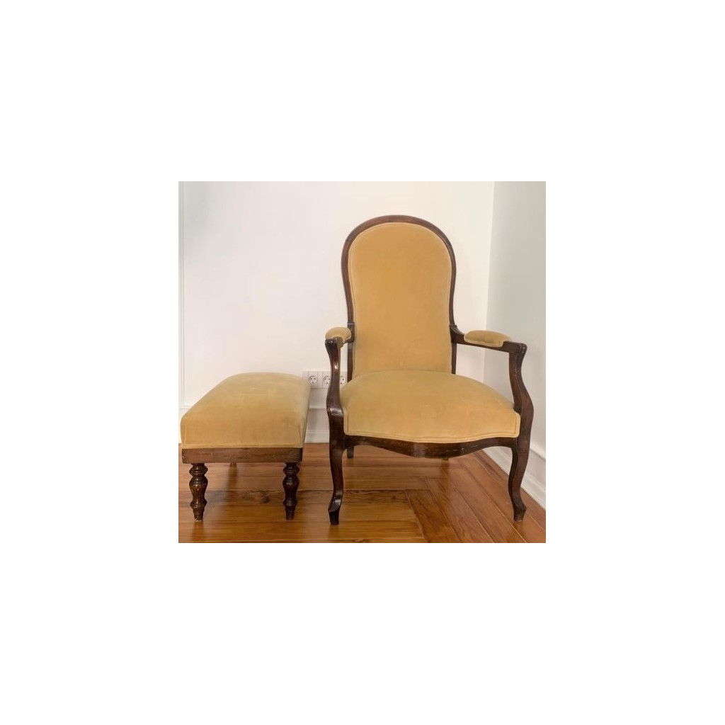 Armchair with footrest