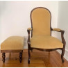Armchair with footrest